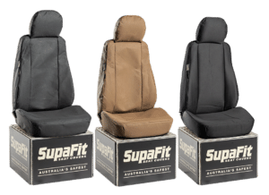 Custom grey, tan, and black SupaFit vehicle seat covers displayed on branded boxes.